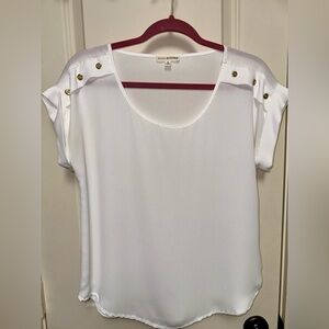 White blouse with gold detail